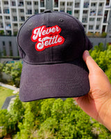 Never Settle Baseball Cap
