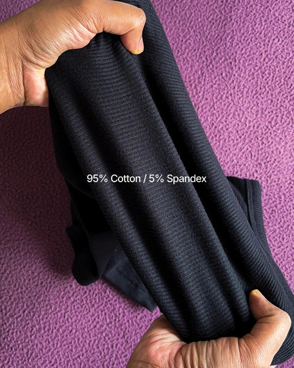 Close-up showing the flexibility of the gym vest fabric