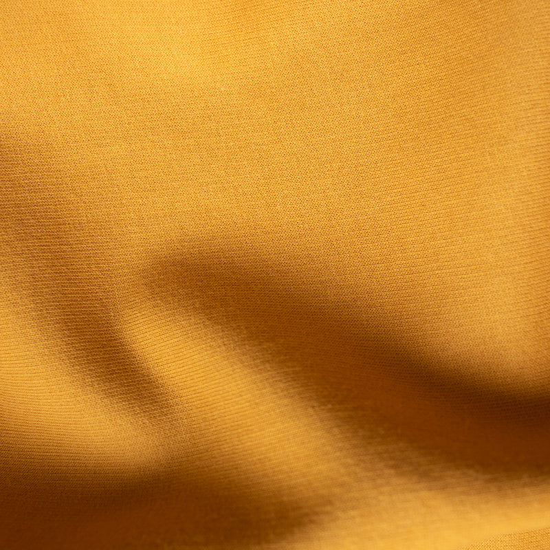 Wolfattire_mustard yellow sweatshirt closeup
